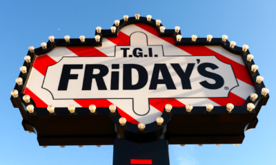 Classic TGI Fridays marquee sign with red-and-white stripes