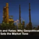 An oil refinery lit up at dusk
