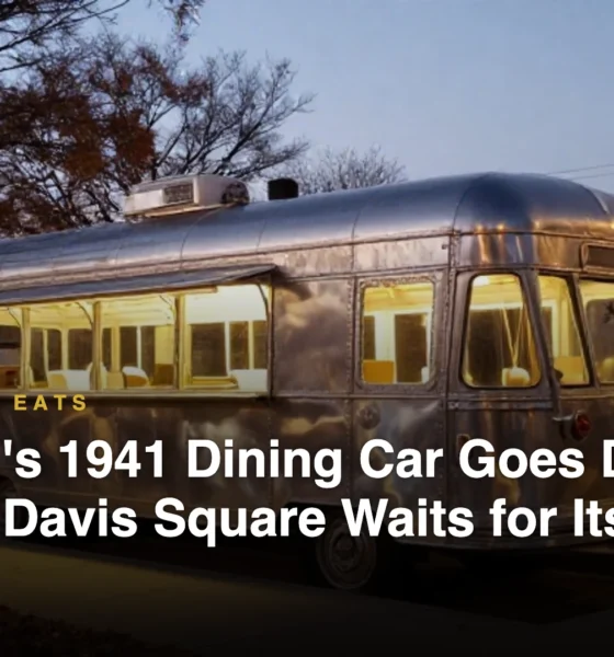 Illustration of a vintage stainless-steel lunch car diner on a city corner at dusk, lights off