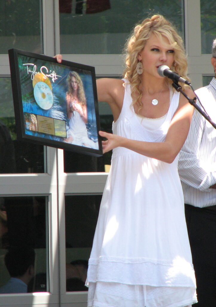 Taylor Swift performs during a 2007 concert promoting her debut album.